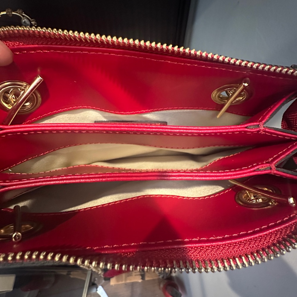 Valentino Luxury Handbag with Gold Accents - Picture 3 of 8